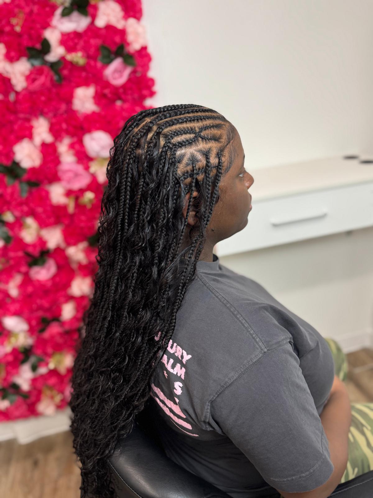 Client protective hairstyle by Melanie Hair Braiding